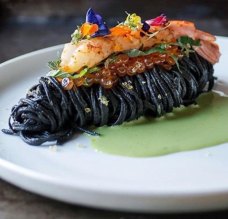 squid ink pasta with grilled prawn and salmon cavier